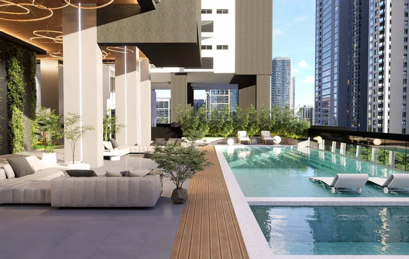 Piscina y área social elevada con vista al skyline en Sky Parc II